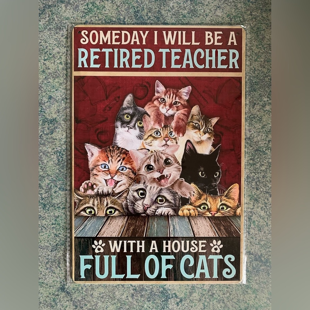 Metal sign - retired teacher